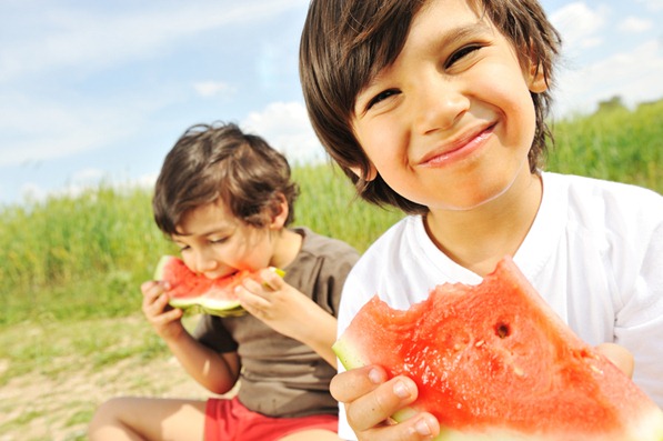 Eating watermelon outside